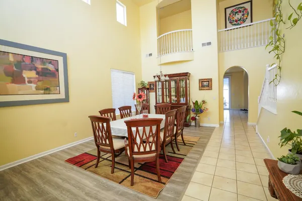 a bedroom with a bed and a table