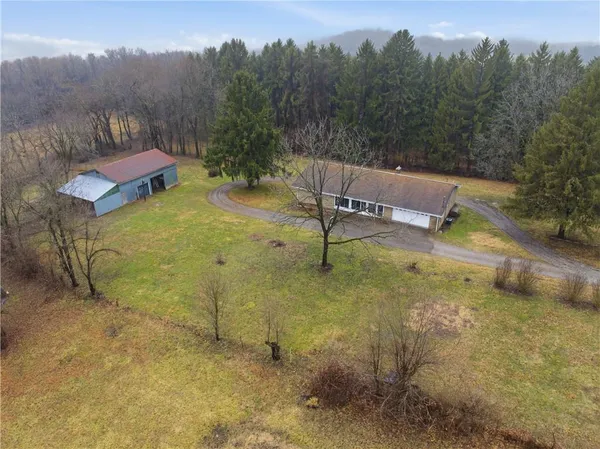 a view of a lake with a yard