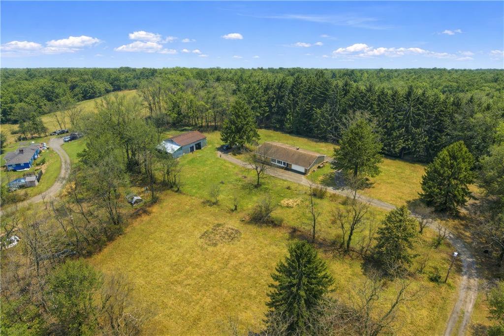 353 Thompson Hill Road Aliquippa, PA 15001 - Photo 47 of 49 a view of a lake with a yard