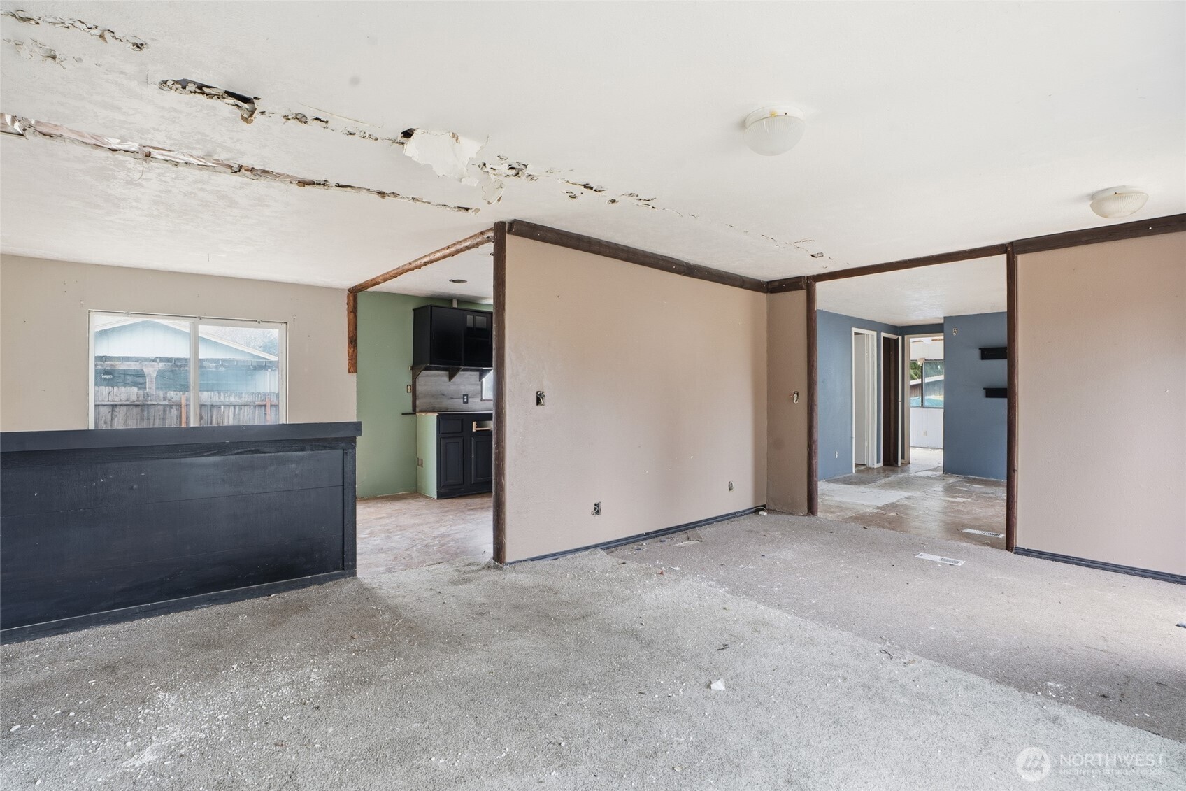 106 Wilford Road Silverlake, WA 98645 - Photo 14 of 32 a view of a big room with windows and cabinet