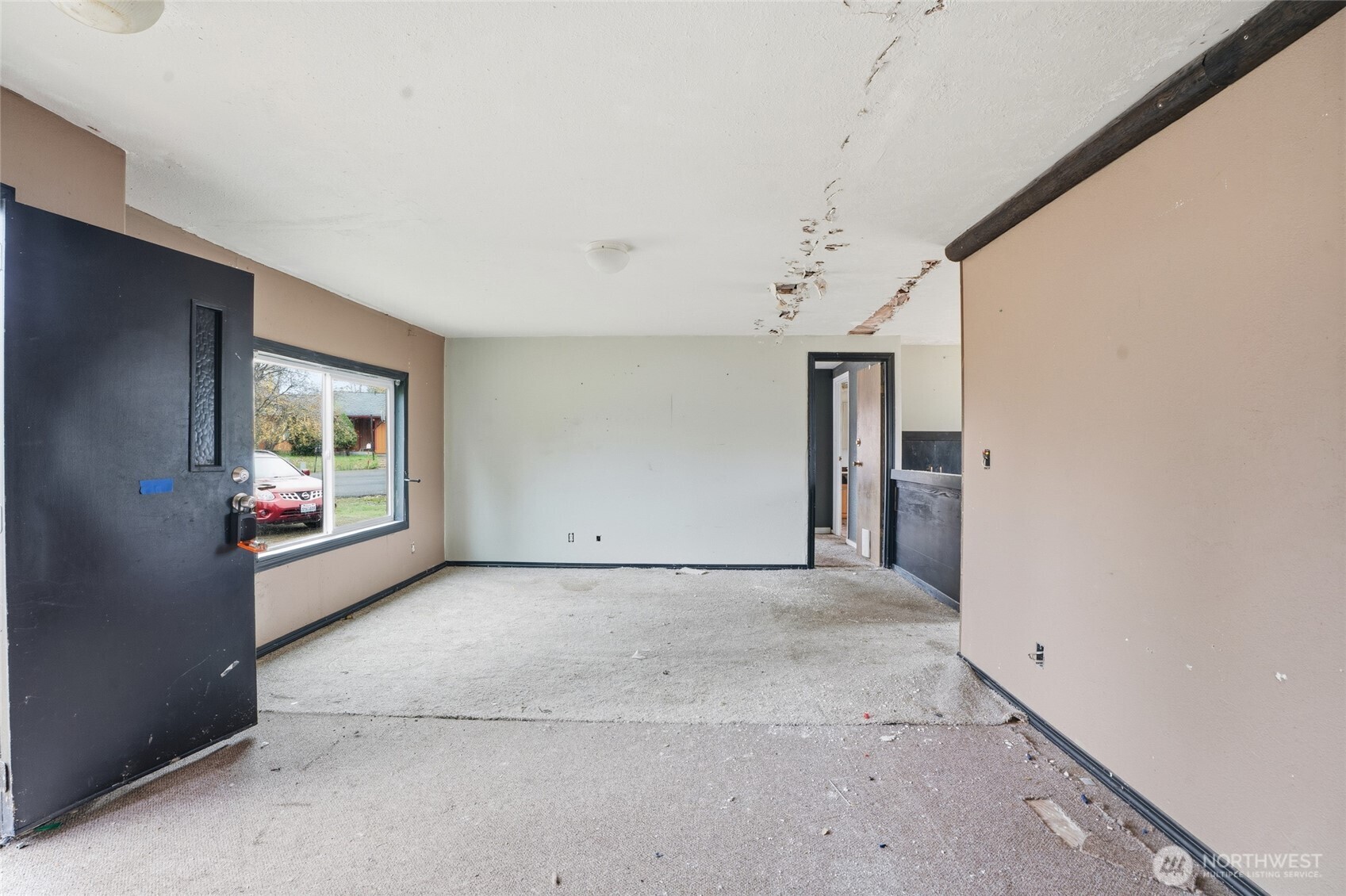 106 Wilford Road Silverlake, WA 98645 - Photo 15 of 32 a view of empty room with window and fireplace