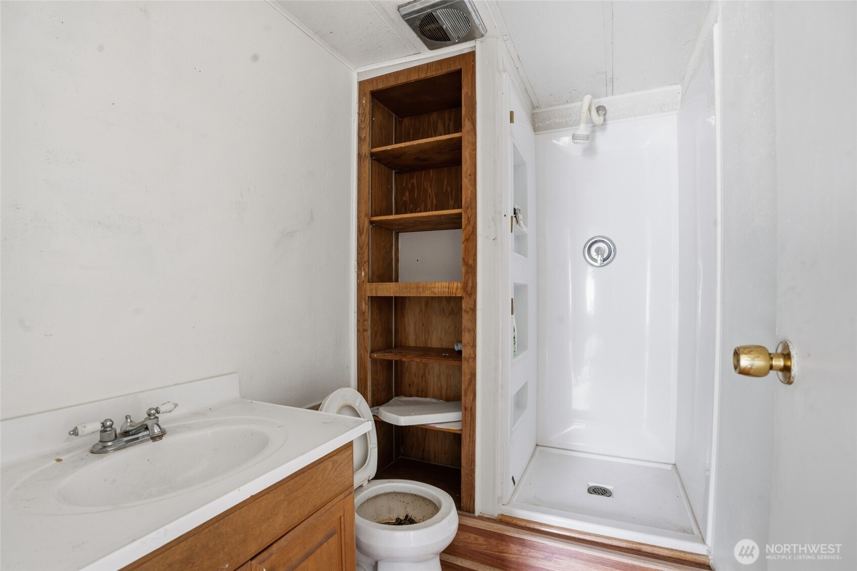 106 Wilford Road Silverlake, WA 98645 - Photo 22 of 32 a bathroom with a granite countertop bathtub shower sink vanity and toilet