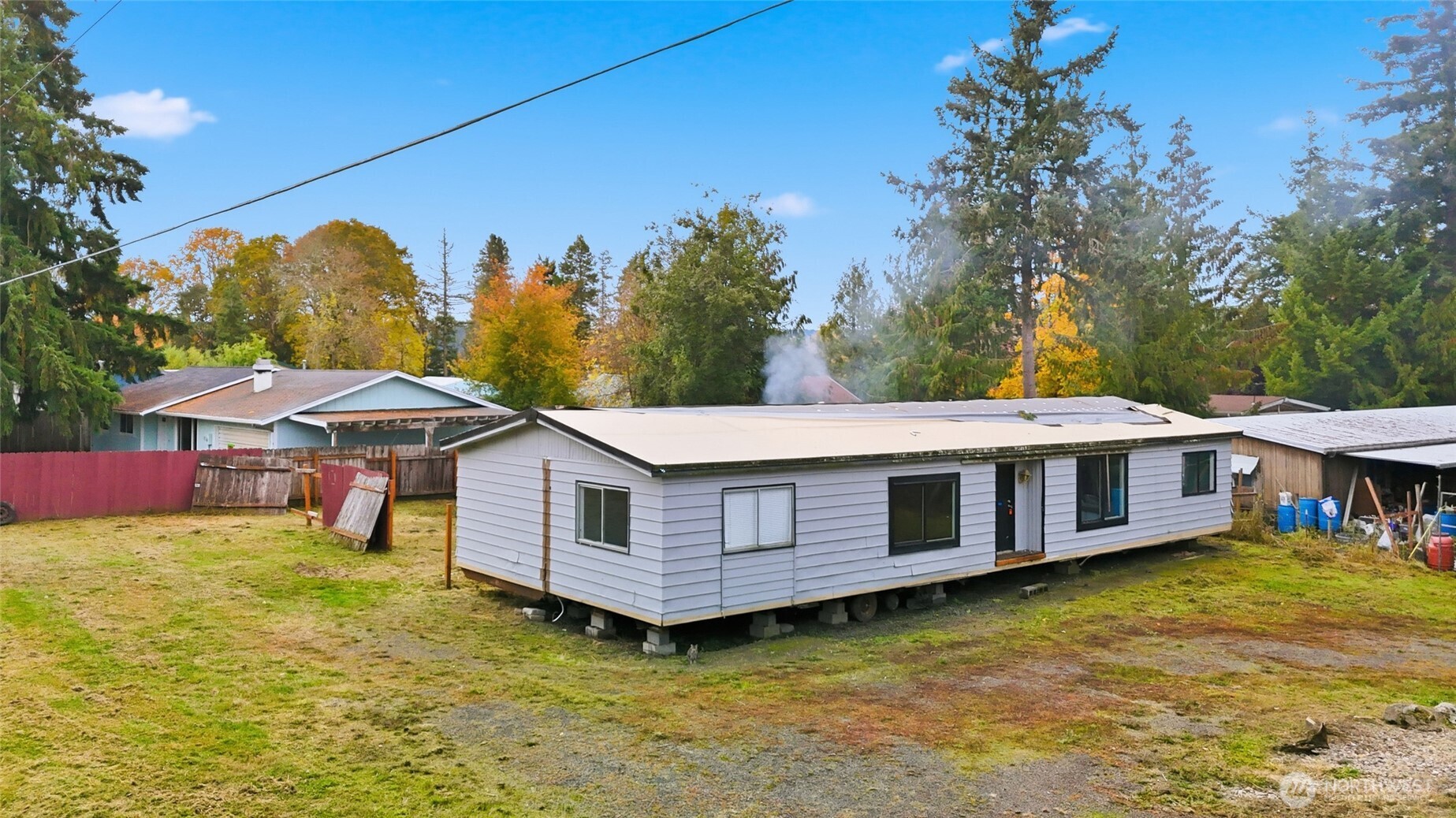 106 Wilford Road Silverlake, WA 98645 - Photo 3 of 32 a view of a house with a yard and sitting area