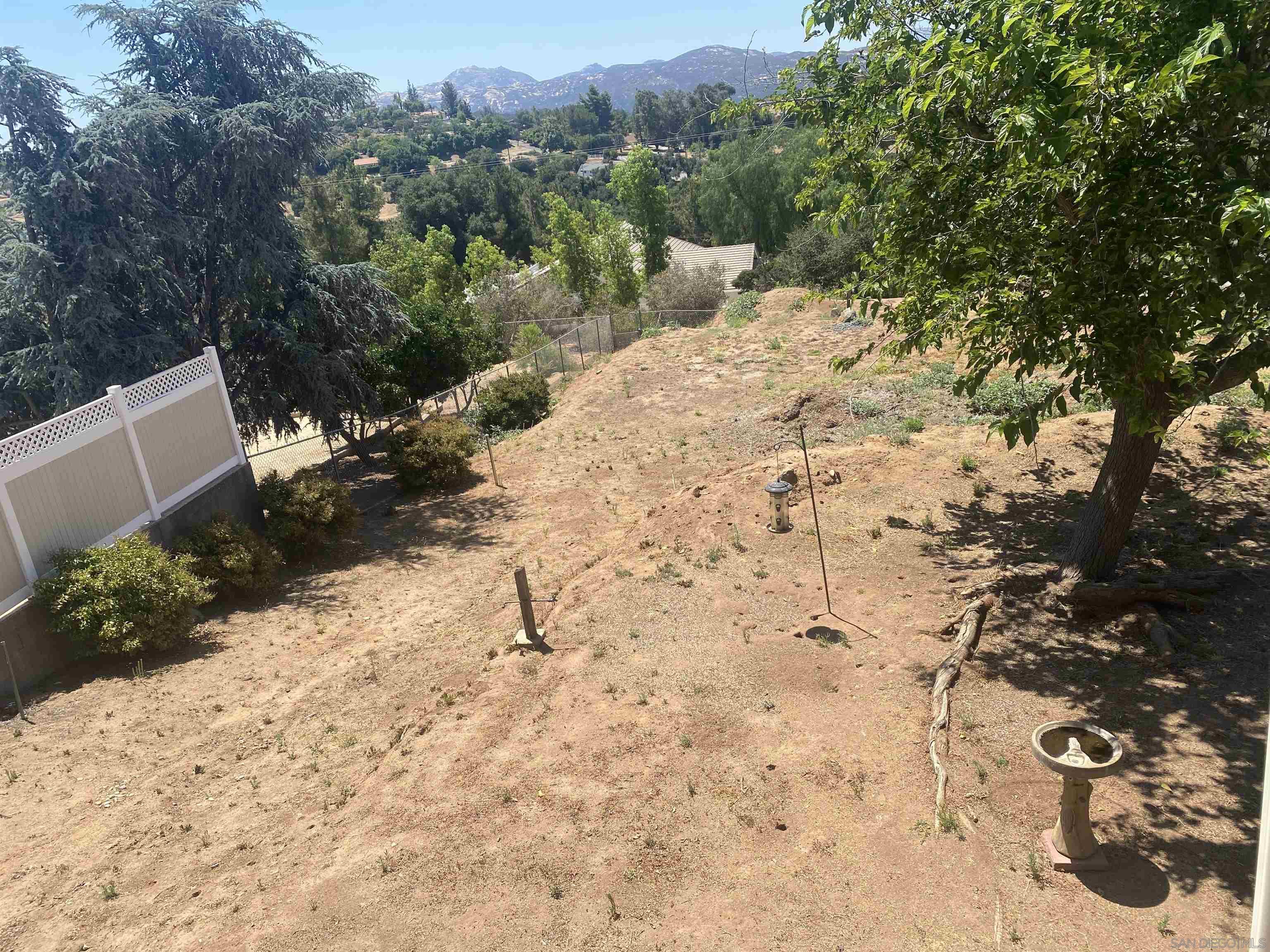 2955 Vee View Road Alpine, CA 91901 - Photo 6 of 9 a view of a yard with a tree