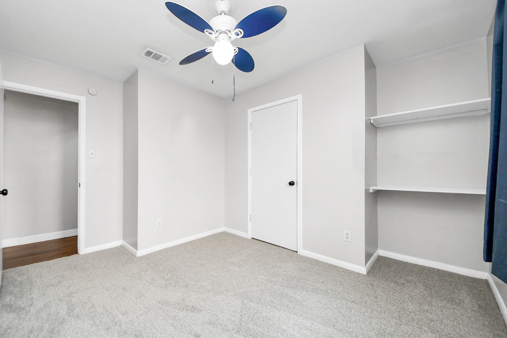 28707 Stapleford Street Spring, TX 77386 - Photo 30 of 38 an empty room with closet and a ceiling fan