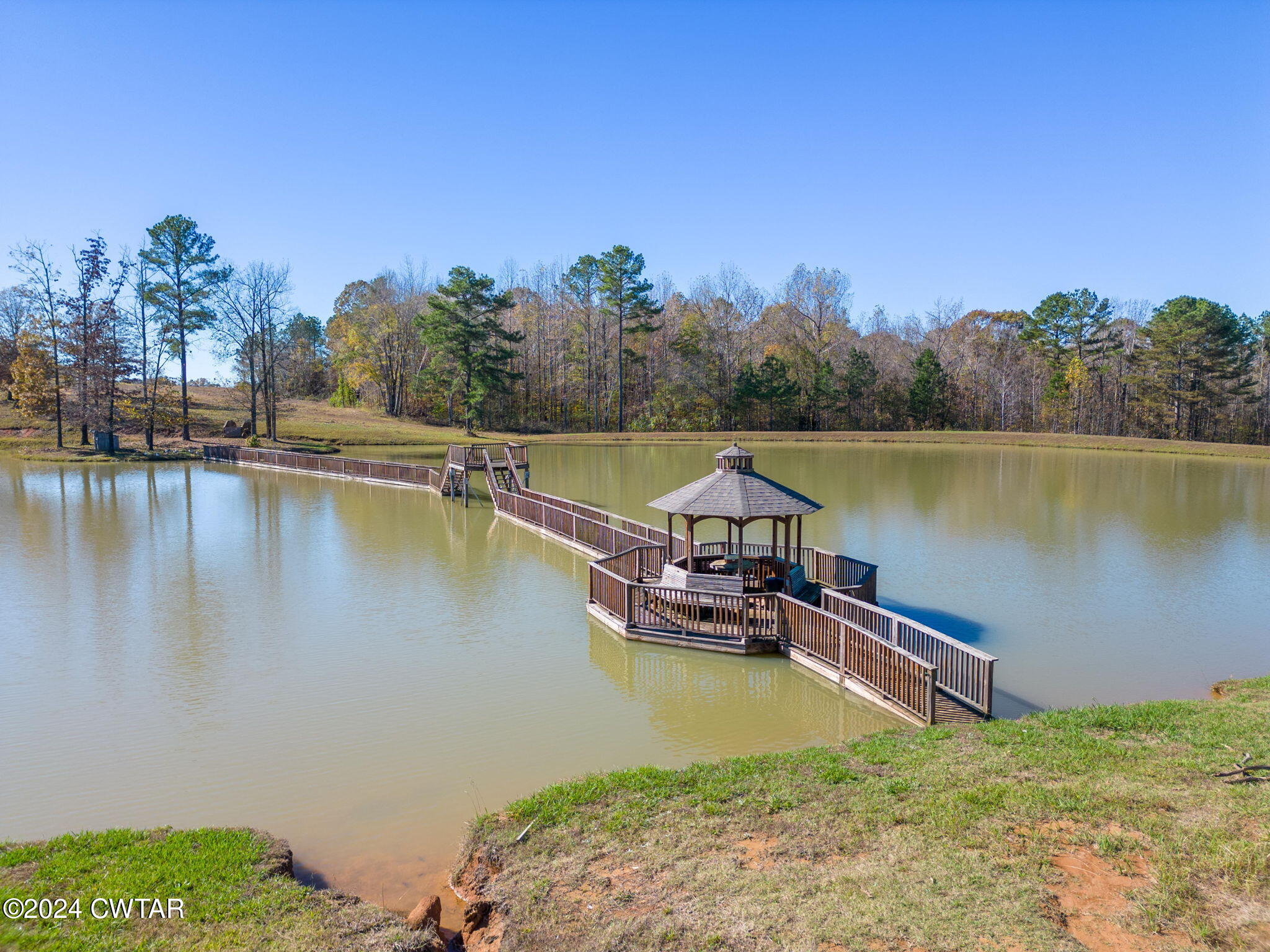 1175 Holly Springs Road Henderson, TN 38340 - Photo 84 of 108 a view of a lake with houses