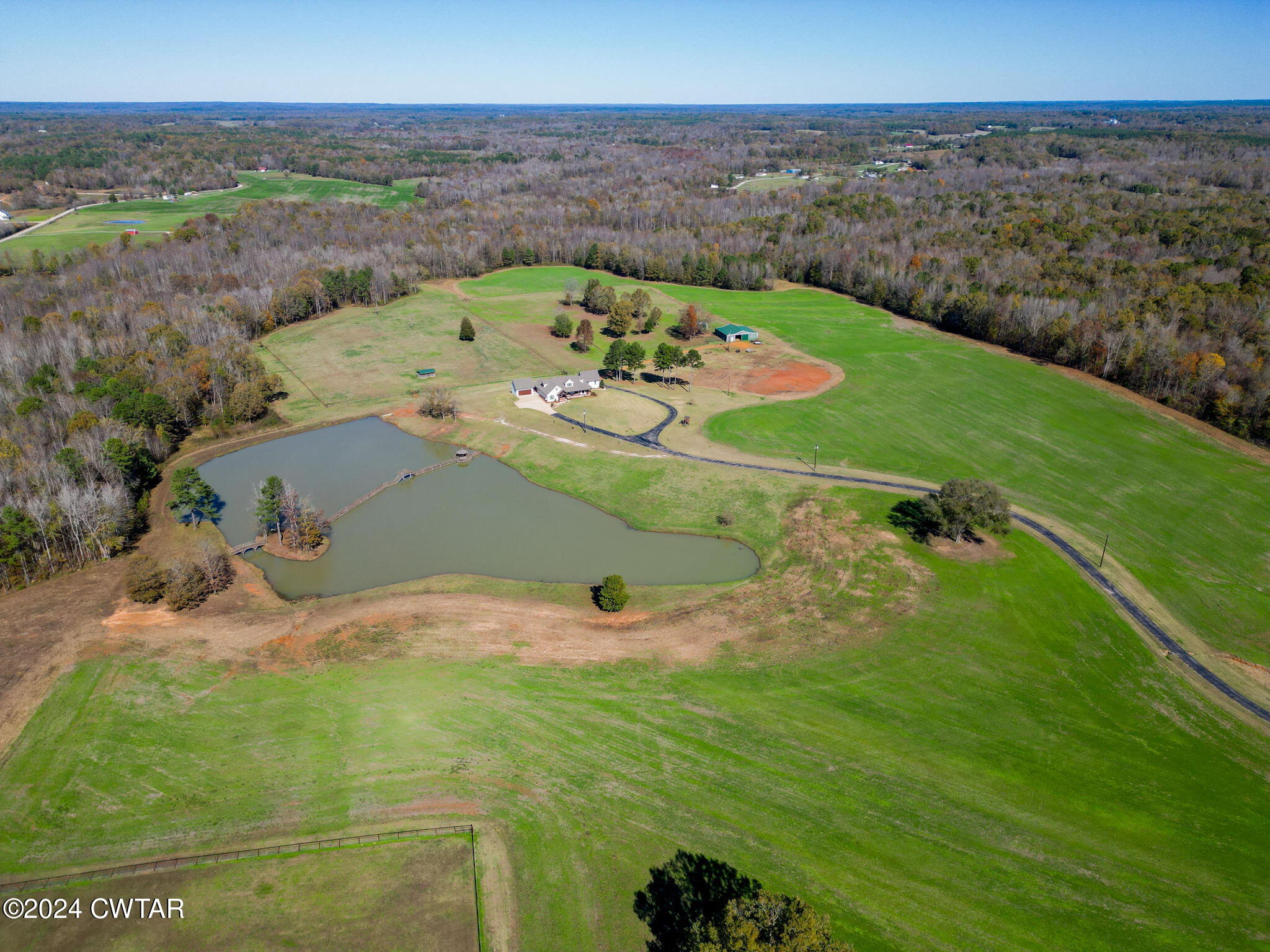 1175 Holly Springs Road Henderson, TN 38340 - Photo 90 of 108 a view of a big yard with an outdoor seating