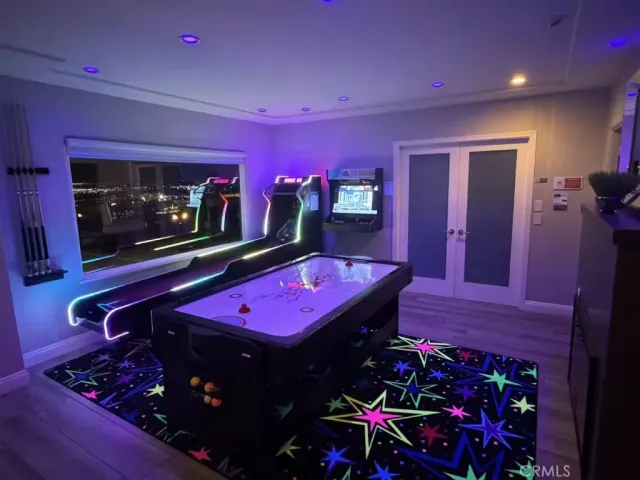 a view of a terrace with couches and city view