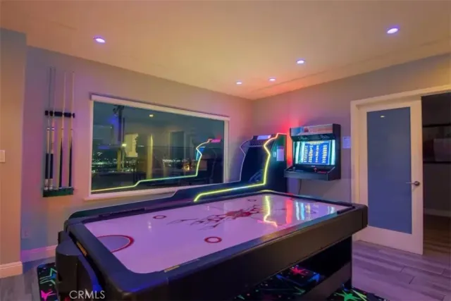 an outdoor living room with patio furniture and a potted plant