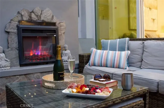 a room with furniture and a fireplace