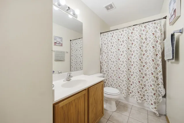 a view of a backyard with sitting area