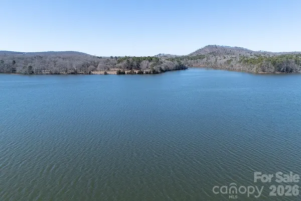 a view of lake with mountain