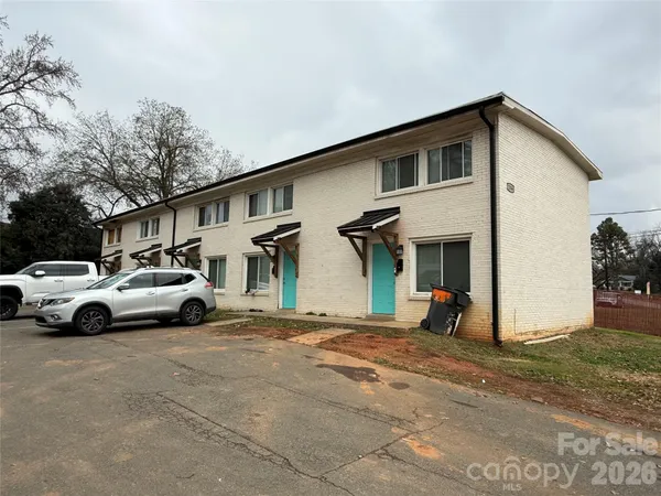 a car parked in front of a house