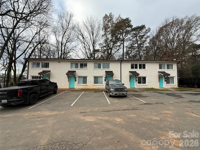a view of car parked in front of house