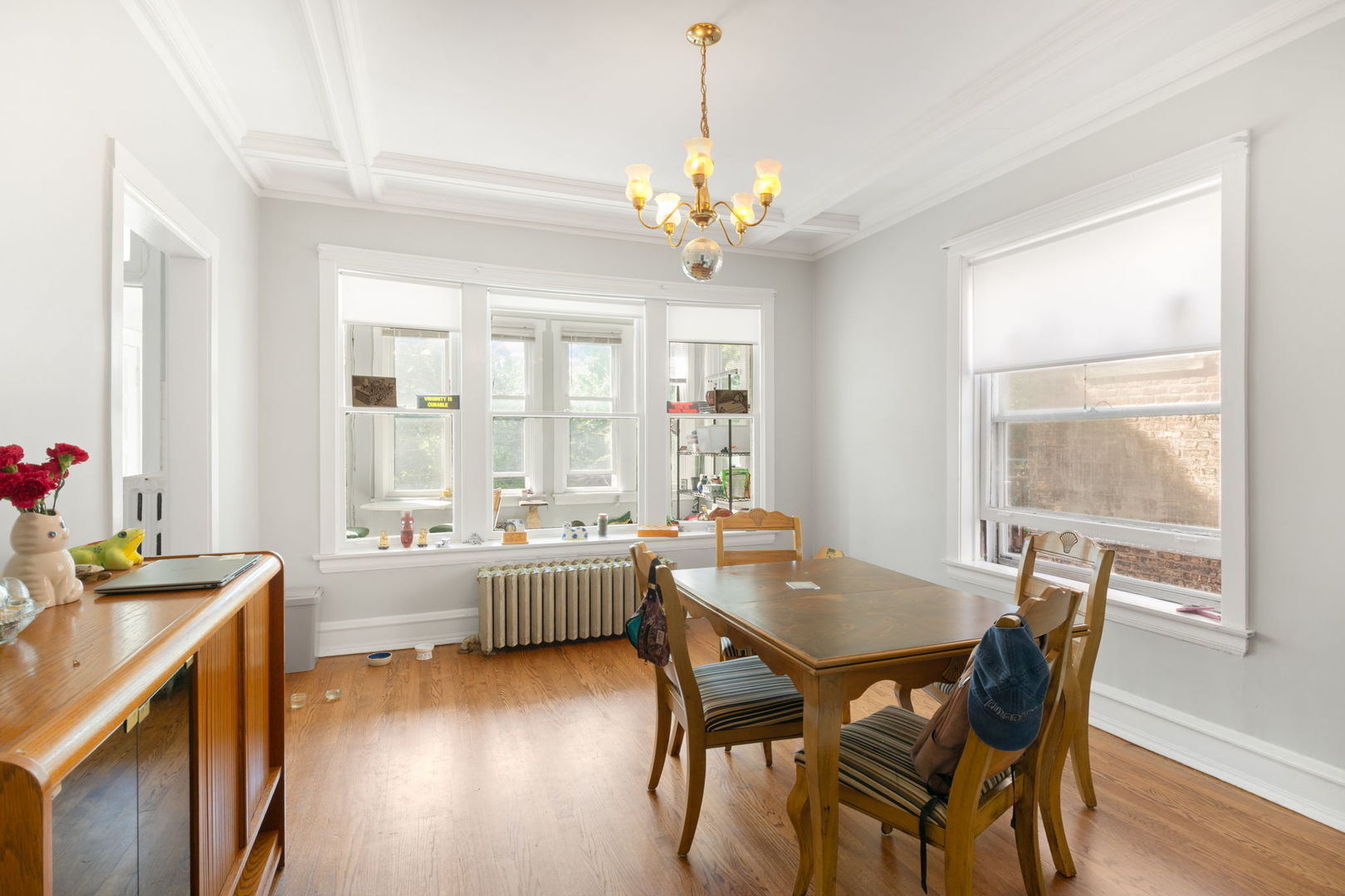 1311 West Thorndale Avenue Chicago, IL 60660 - Photo 12 of 28 a view of a dining room with furniture window and outside view