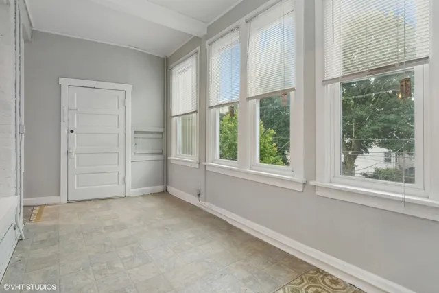 an empty room with windows