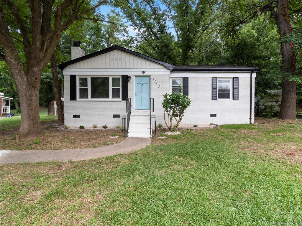 4152 Blenhein Road Charlotte, NC 28208 - Photo 2 of 34 a front view of house with a garden