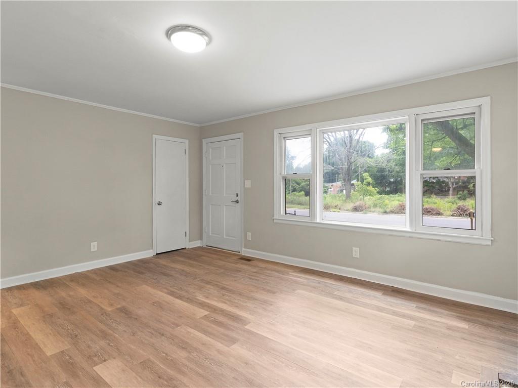 4152 Blenhein Road Charlotte, NC 28208 - Photo 11 of 34 a view of an empty room with a window