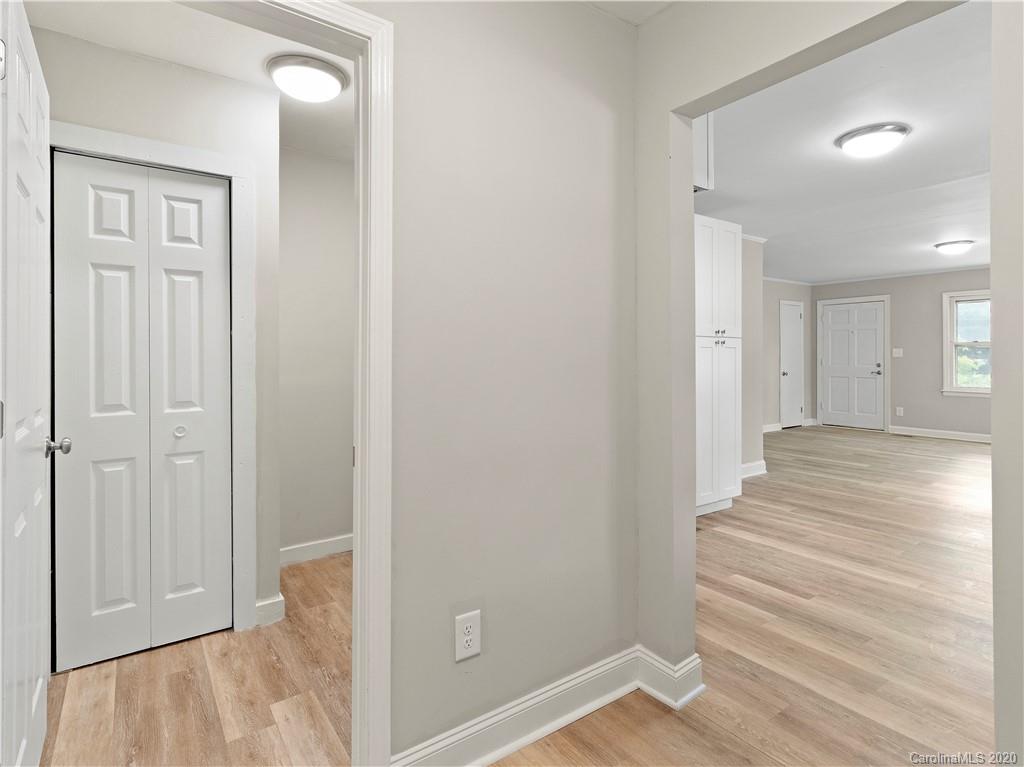 4152 Blenhein Road Charlotte, NC 28208 - Photo 34 of 34 a view of a hallway with wooden floor and closet