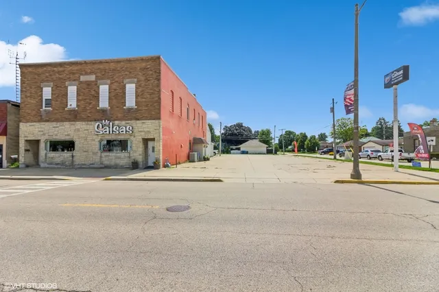 a front view of a building with street view