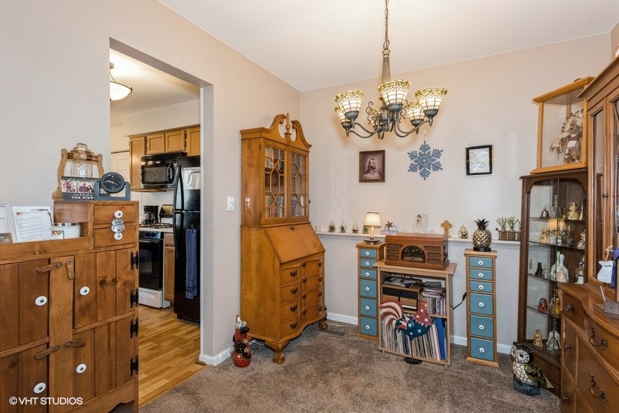-n116 Windermere Road, Unit 2001 Winfield, IL 60190 - Photo 3 of 12 a view of a room with gym equipment