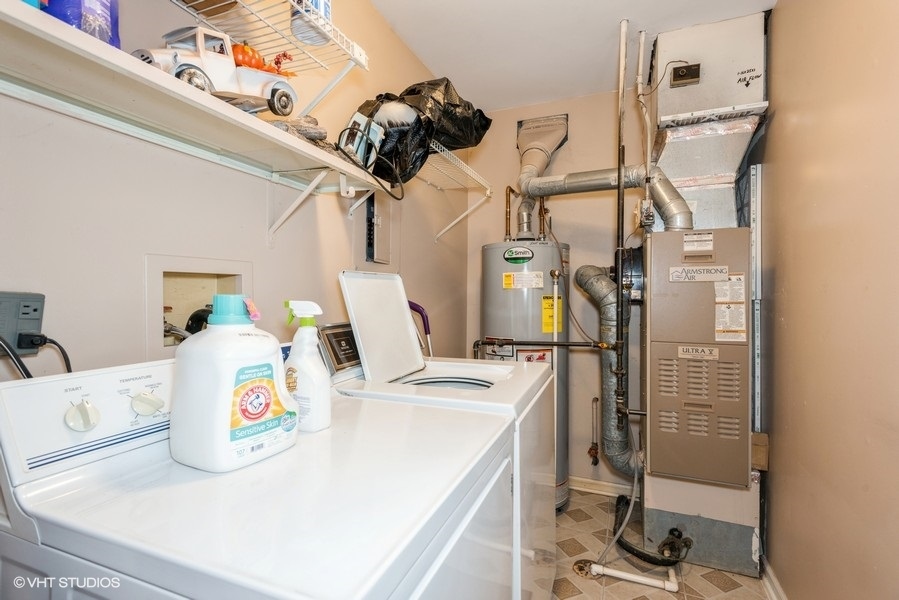 -n116 Windermere Road, Unit 2001 Winfield, IL 60190 - Photo 10 of 12 a utility room with dryer and washer