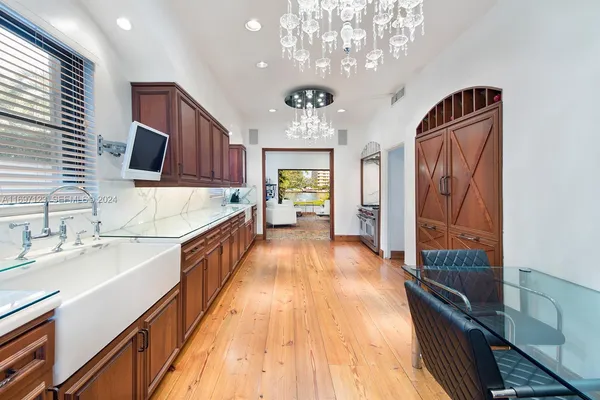 a large kitchen with kitchen island granite countertop a large island in the center