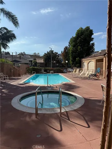 a swimming pool view with a outdoor space