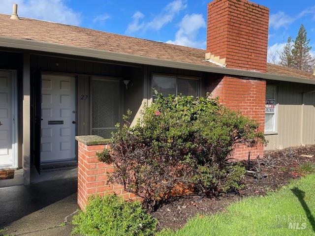 27 Woodgreen Street Santa Rosa, CA 95409 - Photo 2 of 11 a front view of a house with a yard