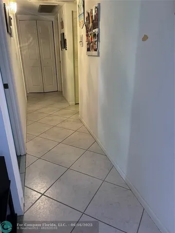 a view of a utility room with a sink