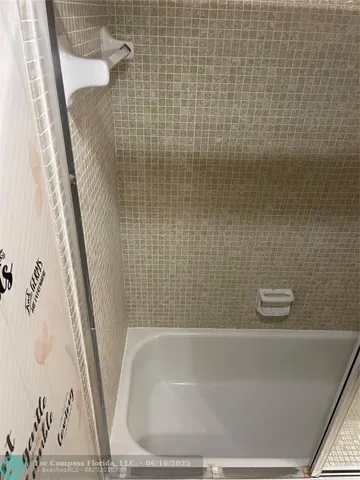 a bathroom with a bathtub