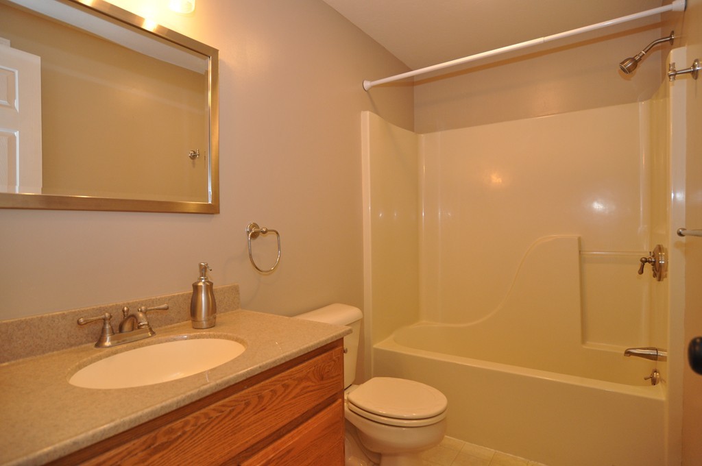 496 Loring Road Barre, MA 01005 - Photo 17 of 27 a bathroom with a granite countertop sink toilet and shower
