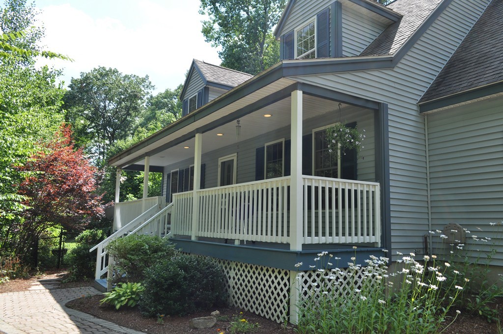 496 Loring Road Barre, MA 01005 - Photo 2 of 27 a view of a house with a small yard