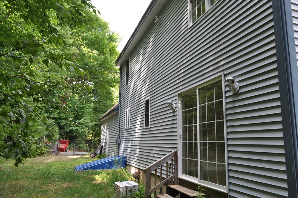 496 Loring Road Barre, MA 01005 - Photo 25 of 27 a view of house with backyard