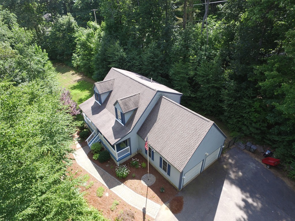 496 Loring Road Barre, MA 01005 - Photo 26 of 27 an aerial view of a house with a yard and large trees