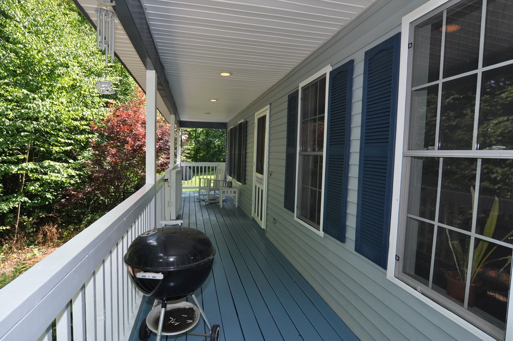496 Loring Road Barre, MA 01005 - Photo 4 of 27 a view of balcony with furniture