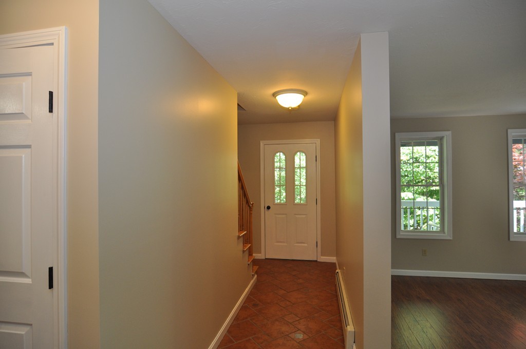 496 Loring Road Barre, MA 01005 - Photo 9 of 27 an empty room with windows and closet
