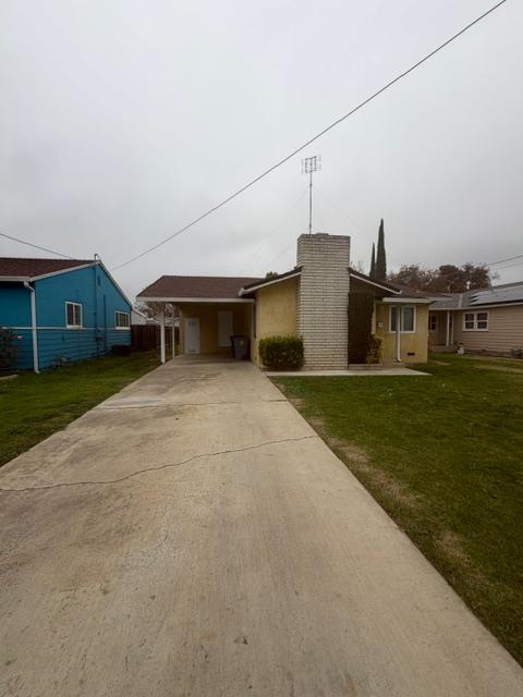 725 Sycamore Avenue Gustine, CA 95322 - Photo 2 of 31 a view of a house with a big yard