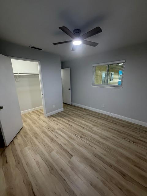 725 Sycamore Avenue Gustine, CA 95322 - Photo 31 of 31 a view of empty room with wooden floor