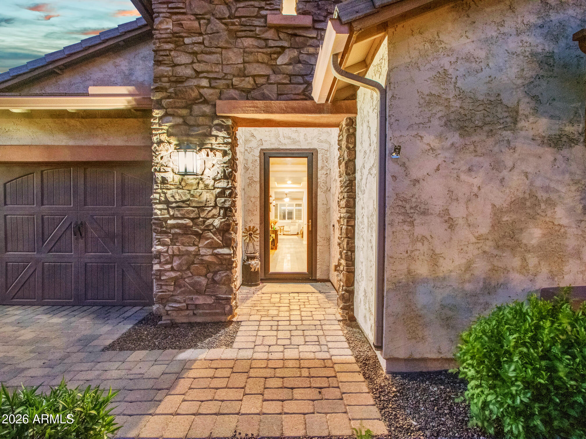 18216 West Montecito Avenue Goodyear, AZ 85395 - Photo 5 of 26 Evening_01_Front-(4)