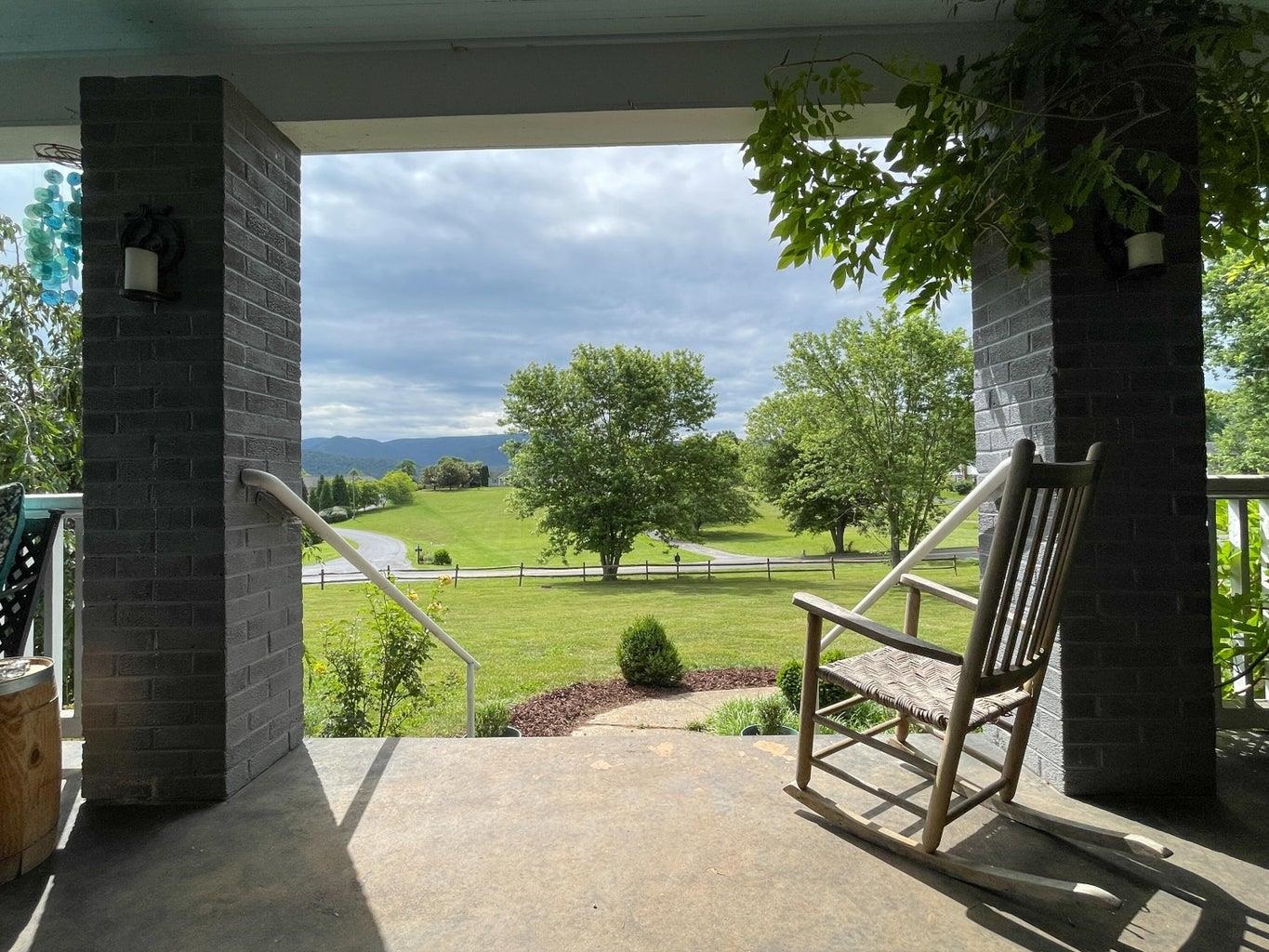 3416 Forge Road Glasgow, VA 24555 - Photo 12 of 51 a view of a bench in a garden