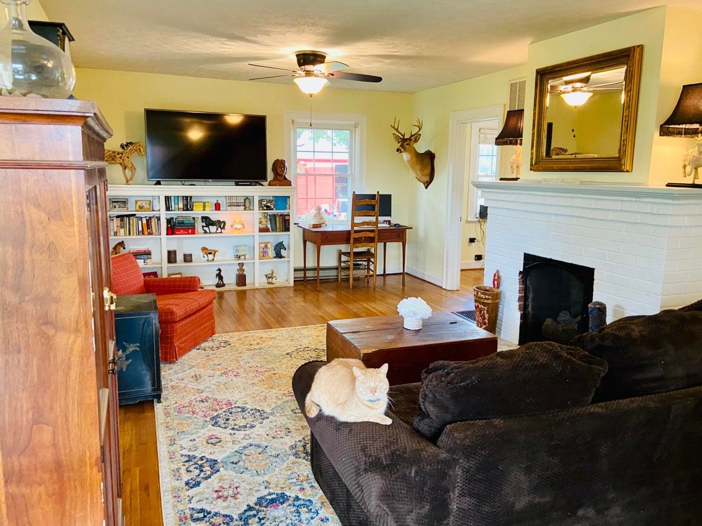 3416 Forge Road Glasgow, VA 24555 - Photo 13 of 51 a living room with furniture and a flat screen tv