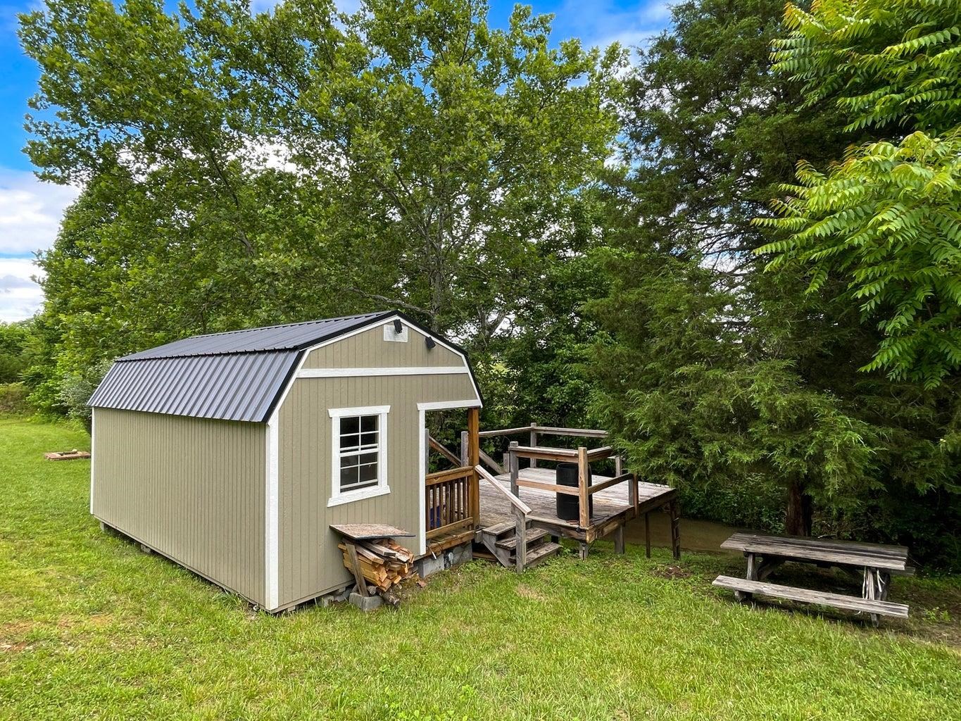 3416 Forge Road Glasgow, VA 24555 - Photo 26 of 51 a front view of a house with a yard