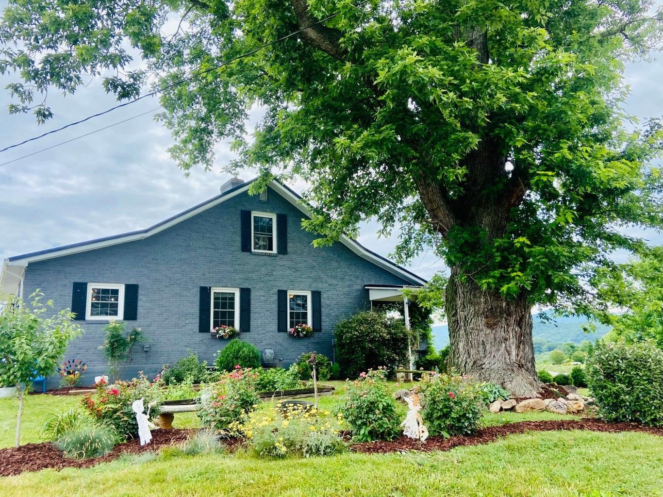 3416 Forge Road Glasgow, VA 24555 - Photo 3 of 51 a front view of a house with a yard