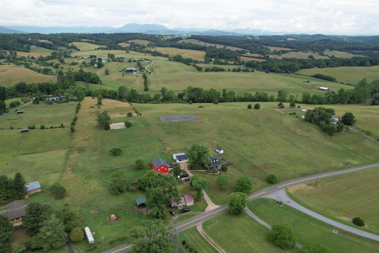 3416 Forge Road Glasgow, VA 24555 - Photo 35 of 51 an aerial view of lake residential houses with outdoor space and seating