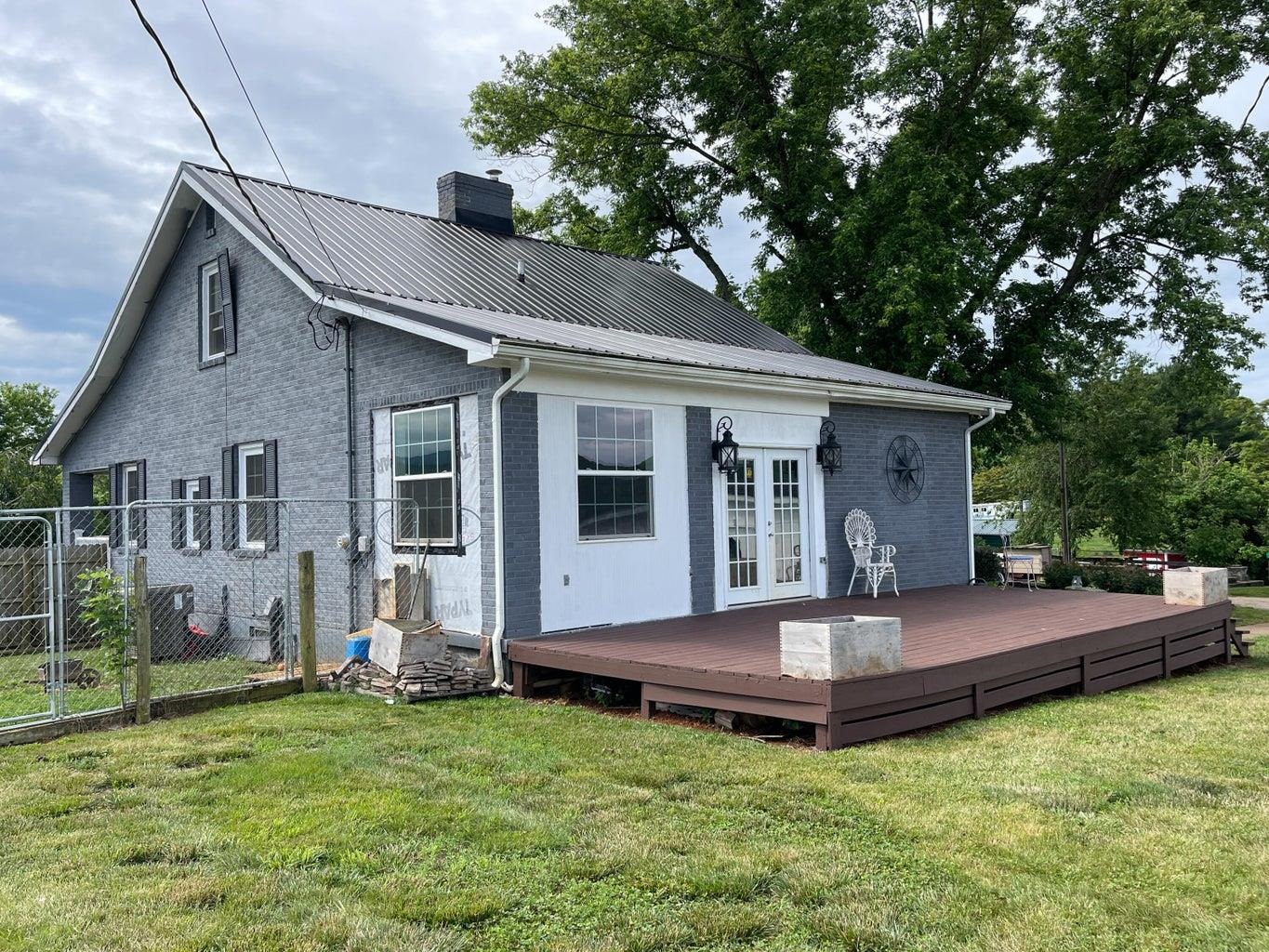 3416 Forge Road Glasgow, VA 24555 - Photo 9 of 51 a view of a house with a yard porch and sitting area