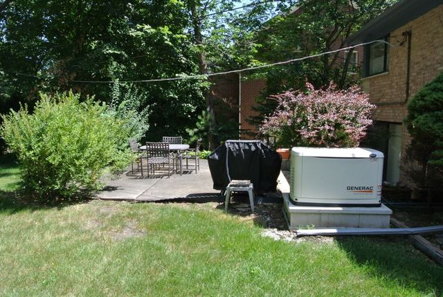 1334 Ridge Road Northbrook, IL 60062 - Photo 14 of 17 a view of a chair and table in the garden
