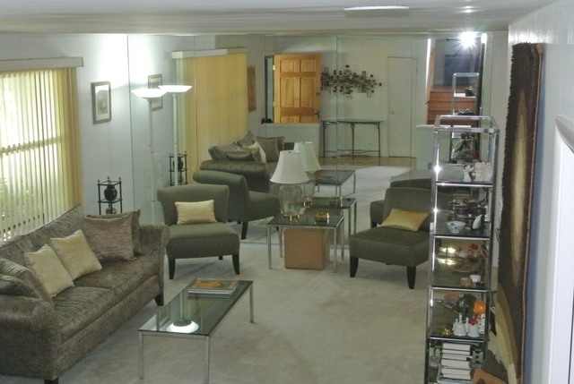1334 Ridge Road Northbrook, IL 60062 - Photo 4 of 17 a living room with furniture and a chandelier