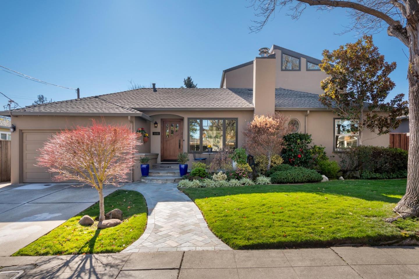405 29th Avenue San Mateo, CA 94403 - Photo 1 of 22 a front view of a house with garden