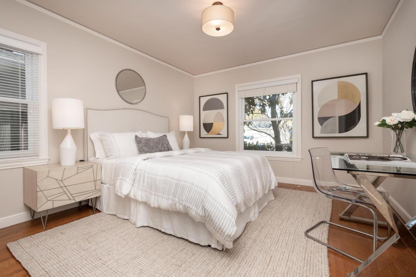 405 29th Avenue San Mateo, CA 94403 - Photo 11 of 22 a bed room with a bed mirror and a window
